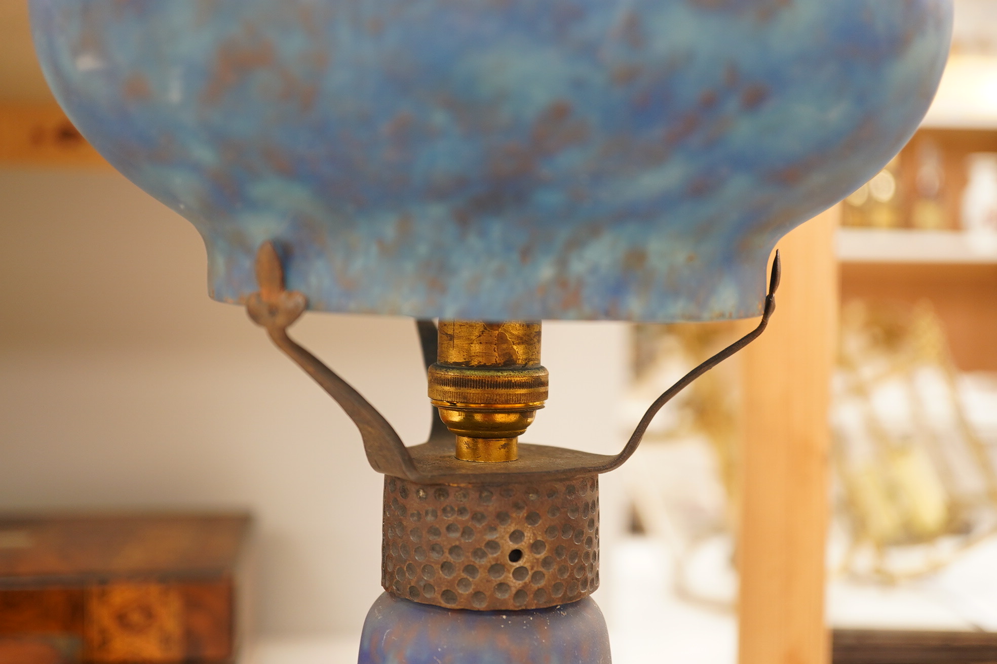 Art Nouveau, ‘Delatte’ mushroom blue glass lamp with hammered metal mount, 45cm high. Condition - good